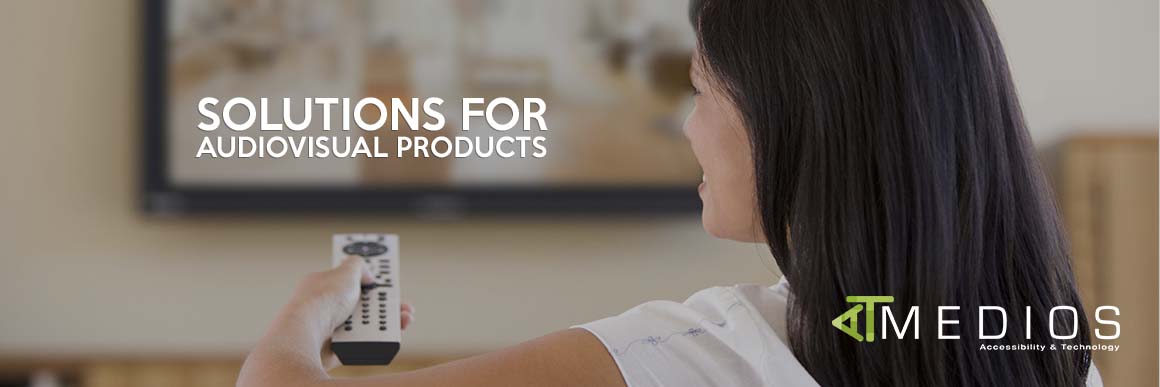 Woman watching television and holding a remote control in her left hand.